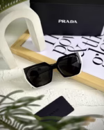 خرید قیمت عینک آفتابی زنانه پرادا مدل PRADA SPR 15W-F عثمانی اپتیک