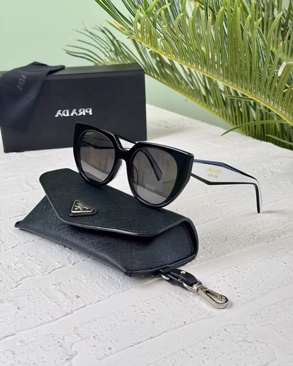 خرید قیمت عینک آفتابی زنانه پرادا مدل PRADA SPR14W-F عثمانی اپتیک
