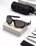 خرید قیمت عینک ورزشی اسپرت اوکلی پلاریزه مدل OAKLEY OO9137 عثمانی اپتیک